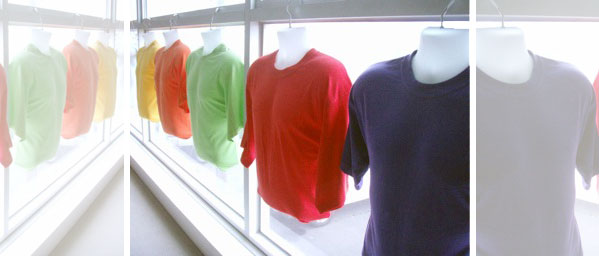 t-shirts in a window